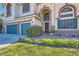 Landscaped front yard with a brick walkway leading to the house entrance at 6901 Copper Kettle Ave, Las Vegas, NV 89130