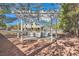 White wooden pergola with seating area overlooking the house at 6901 Copper Kettle Ave, Las Vegas, NV 89130