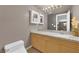 Small bathroom with single vanity and granite countertop at 6948 Emerald Springs Ln, Las Vegas, NV 89113