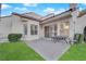 Spacious patio with table and chairs, perfect for outdoor dining at 6948 Emerald Springs Ln, Las Vegas, NV 89113