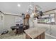 Kitchen with granite island and pot rack at 7026 Westpark Ct, Las Vegas, NV 89147