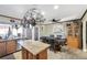 Spacious kitchen with island, stainless steel appliances, and wood cabinets at 7026 Westpark Ct, Las Vegas, NV 89147