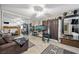 Living room with large mirror and aquarium at 7026 Westpark Ct, Las Vegas, NV 89147