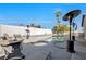 Sun-drenched patio with a fire pit and a relaxing pool and spa at 7026 Westpark Ct, Las Vegas, NV 89147