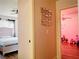 Hallway with access to bedrooms, one with a pink theme at 7629 Delaware Bay Dr, Las Vegas, NV 89128