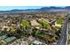 Community overview featuring golf course, tennis courts, and residential homes at 7732 Tinted Mesa Ct, Las Vegas, NV 89149