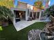 Backyard oasis with patio, landscaping, and fountain at 7732 Tinted Mesa Ct, Las Vegas, NV 89149