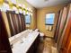 Clean bathroom with shower/tub combo and updated vanity at 7732 Tinted Mesa Ct, Las Vegas, NV 89149