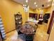 Kitchen breakfast nook with marble top table and matching chairs at 7732 Tinted Mesa Ct, Las Vegas, NV 89149