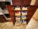 Well-organized pantry with pull-out shelves at 7732 Tinted Mesa Ct, Las Vegas, NV 89149