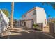 Landscaped backyard with covered patio and gravel at 7809 Smokerise Ct, Las Vegas, NV 89131