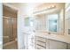 Double vanity bathroom with shower and separate tub at 7809 Smokerise Ct, Las Vegas, NV 89131