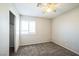 Bedroom with ceiling fan, carpeting, and closet at 7809 Smokerise Ct, Las Vegas, NV 89131