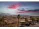 Residential area with mountain backdrop at sunset at 79 E Agate Ave # 306, Las Vegas, NV 89123