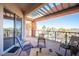 Private balcony with outdoor furniture and scenic view at 79 E Agate Ave # 306, Las Vegas, NV 89123