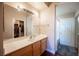 Bathroom with vanity, mirror, and shower/tub combo at 79 E Agate Ave # 306, Las Vegas, NV 89123