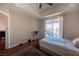 Bright bedroom with balcony access and hardwood floor at 79 E Agate Ave # 306, Las Vegas, NV 89123