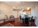 Elegant dining area with hardwood floors and kitchen view at 79 E Agate Ave # 306, Las Vegas, NV 89123