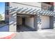 Attached garage with overhead door and ample space for parking at 79 E Agate Ave # 306, Las Vegas, NV 89123