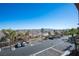 Aerial view of parking lot with mountain views at 79 E Agate Ave # 306, Las Vegas, NV 89123