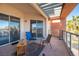 Relaxing patio with seating and sliding glass doors at 79 E Agate Ave # 306, Las Vegas, NV 89123