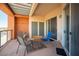 Private patio with seating area and covered pergola at 79 E Agate Ave # 306, Las Vegas, NV 89123