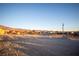 View of the property and surrounding desert landscape at 801 Fort Churchill Rd, Pahrump, NV 89060