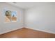 Bright bedroom with hardwood floors and window at 81 Alpine Bay Ave, Las Vegas, NV 89148