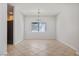 Bright dining room with tiled floors and a chandelier at 81 Alpine Bay Ave, Las Vegas, NV 89148