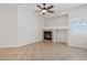 Living room featuring a fireplace and tile flooring at 81 Alpine Bay Ave, Las Vegas, NV 89148