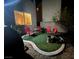 Small backyard with seating area and fire pit at 8384 Creek Canyon Ave, Las Vegas, NV 89113