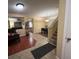 Bright entryway with tile and hardwood floors, showing views of dining and living areas at 8384 Creek Canyon Ave, Las Vegas, NV 89113