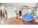 Bright living room with hardwood floors, fireplace, and access to other rooms at 8593 Garden Valley Ct, Las Vegas, NV 89178