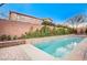 Inviting swimming pool with spa and spacious patio area at 8593 Garden Valley Ct, Las Vegas, NV 89178