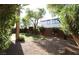 Landscaped backyard with gravel and trees at 8719 Mount Mira Loma Ave, Las Vegas, NV 89178