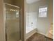 Clean bathroom with shower, bathtub, and double vanity at 8777 W Maule Ave # 2109, Las Vegas, NV 89148