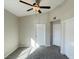 Well-lit bedroom with ceiling fan and ample closet space at 8777 W Maule Ave # 2109, Las Vegas, NV 89148