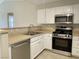 Modern kitchen with stainless steel appliances and white cabinets at 8777 W Maule Ave # 2109, Las Vegas, NV 89148