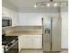 Modern kitchen with stainless steel appliances and white cabinets at 8777 W Maule Ave # 2109, Las Vegas, NV 89148