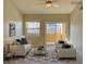 Bright living room with access to a balcony at 8777 W Maule Ave # 2109, Las Vegas, NV 89148