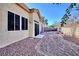 Landscaped backyard with gravel and patio at 8916 Stafford Springs Dr, Las Vegas, NV 89134