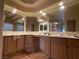 Double vanity bathroom with large mirror at 8916 Stafford Springs Dr, Las Vegas, NV 89134