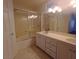 Bathroom with a double vanity, shower, and bathtub at 9523 Cherrydale Ct, Las Vegas, NV 89147