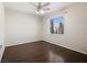 Spacious bedroom with hardwood floors and a window at 9523 Cherrydale Ct, Las Vegas, NV 89147