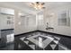 Bright living room with a geometric tile floor and high ceilings at 9523 Cherrydale Ct, Las Vegas, NV 89147