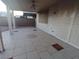 Covered patio with tiled flooring and a decorative medallion at 9523 Cherrydale Ct, Las Vegas, NV 89147