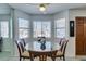 Casual dining area with glass-top table and four chairs at 1005 Sulphur Springs Ln # 202, Las Vegas, NV 89128