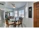 Bright dining area with glass table and four chairs, near kitchen at 1005 Sulphur Springs Ln # 202, Las Vegas, NV 89128