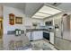 Modern kitchen, featuring stainless steel appliances and granite countertops at 1005 Sulphur Springs Ln # 202, Las Vegas, NV 89128