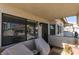 Private patio with covered seating and views at 1005 Sulphur Springs Ln # 202, Las Vegas, NV 89128